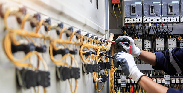 Professional Electrician technician working in Spirit Lake, IA